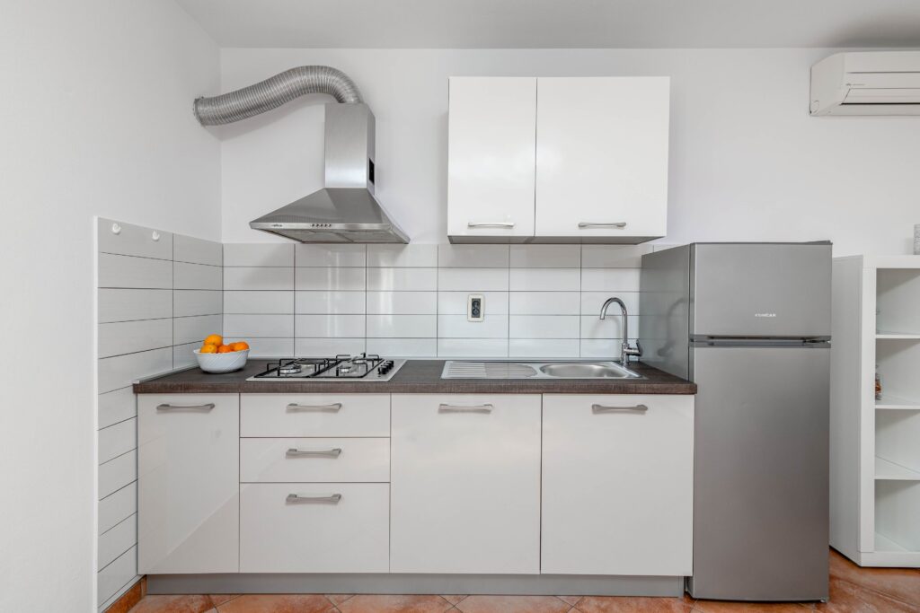 Kitchen with dining area – Manuela Apartments Pula, fully equipped apartment in Pula